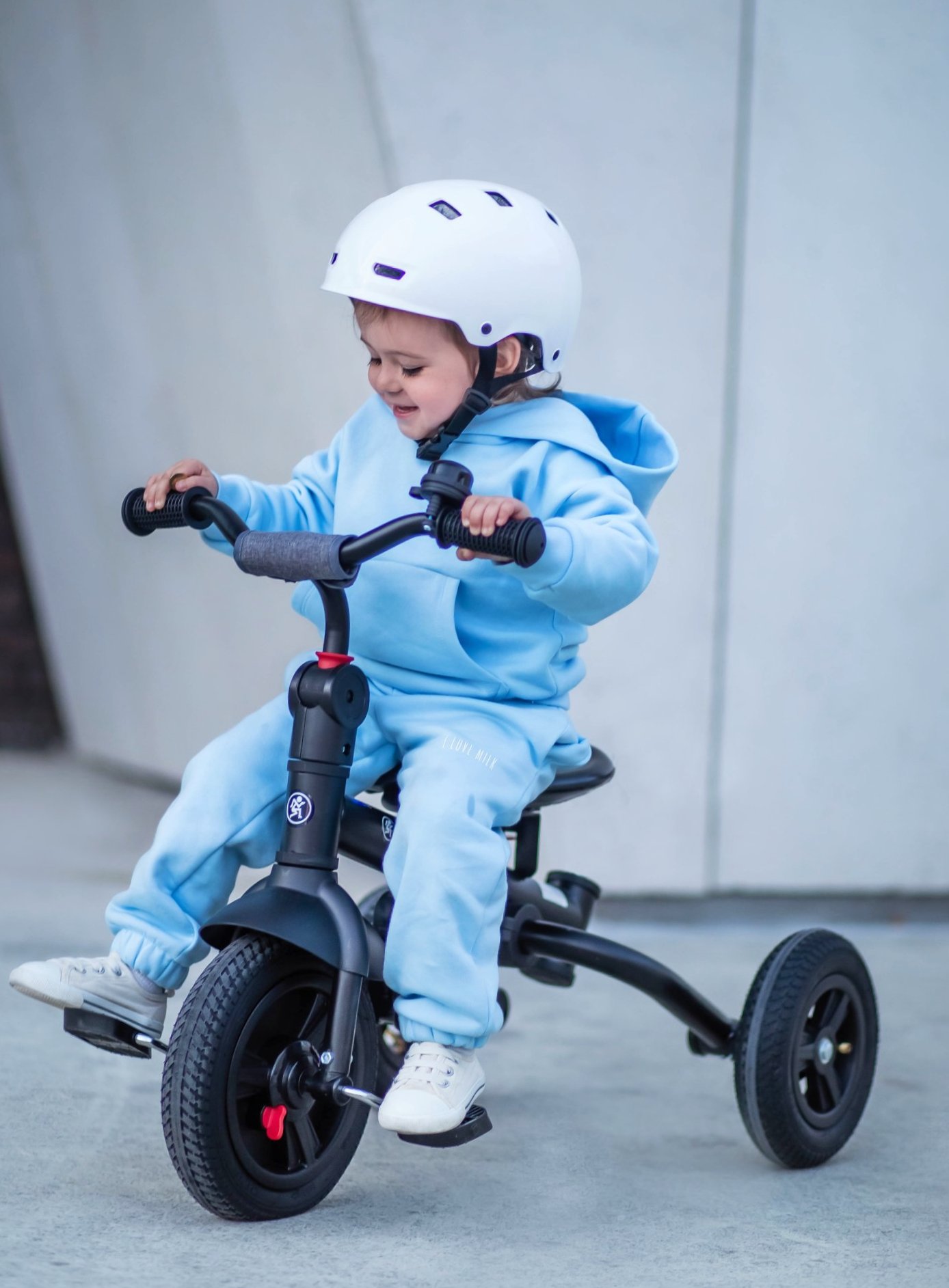 Tricycle Tobi Velar + film de pluie - gris