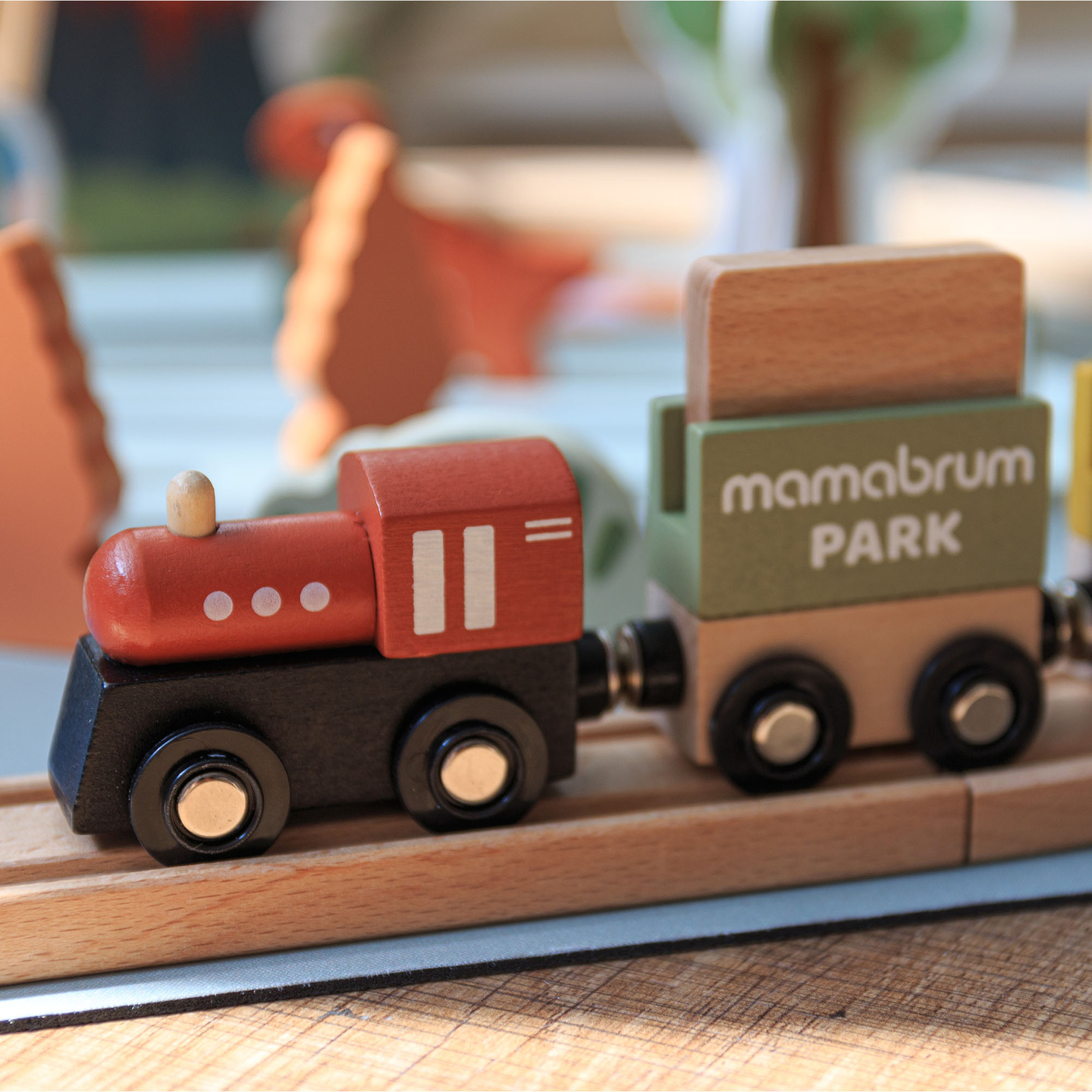 Train en bois Dino Park avec tapis antidérapant - dinosaures, train, rails, volcan, cloche