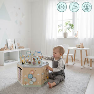 Grand cube éducatif en bois - un jouet Montessori avec un train magnétique et des boucles motrices