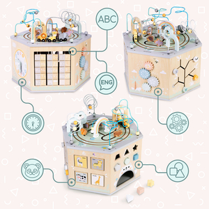 Grand cube éducatif en bois - un jouet Montessori avec un train magnétique et des boucles motrices