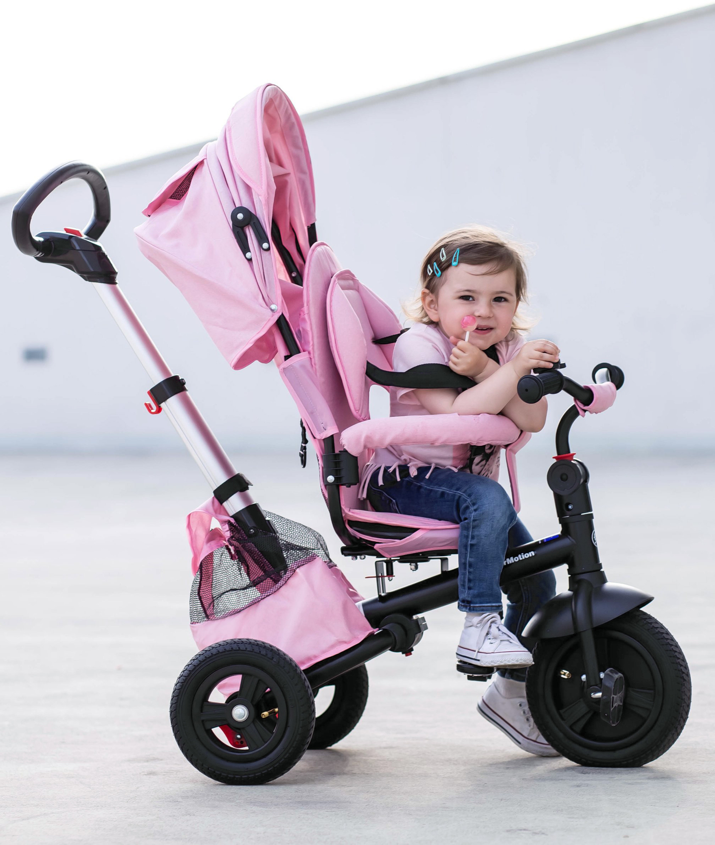 Tricycle Tobi Velar + film de pluie - rose