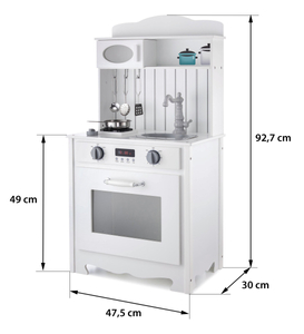 Cuisine en bois blanc avec tablier, accessoires et lampe LED