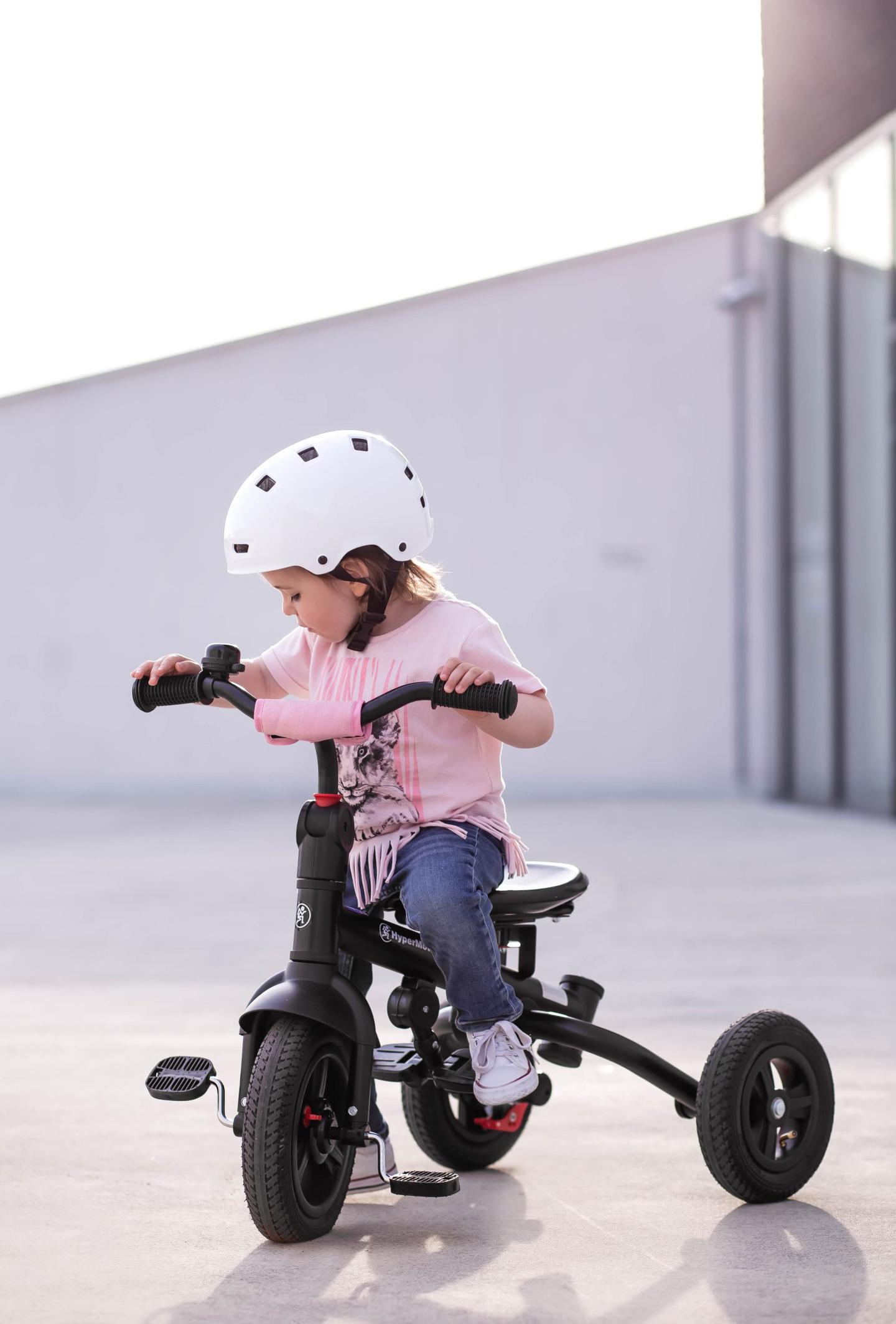 Tricycle Tobi Velar + film de pluie - rose
