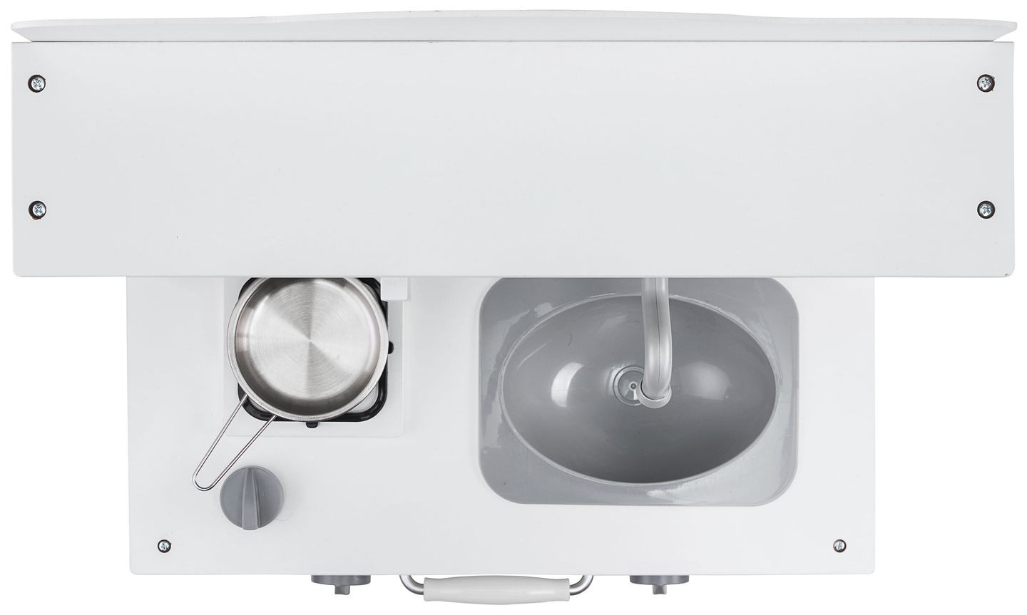 Cuisine en bois blanc avec tablier, accessoires et lampe LED