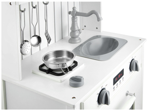 Cuisine en bois blanc avec tablier, accessoires et lampe LED