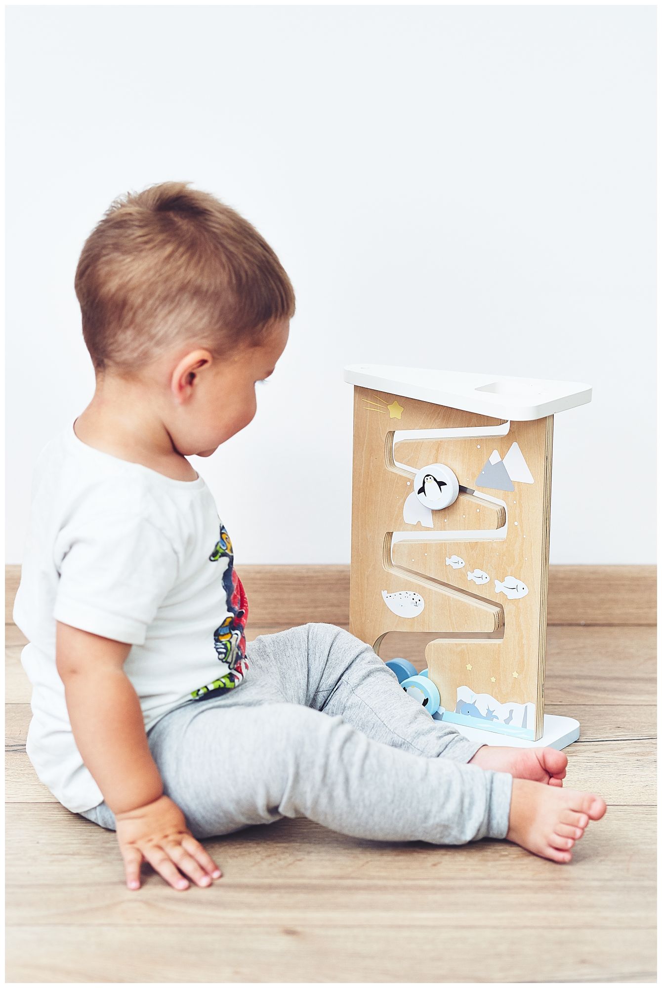 Planche de manipulation sensorielle en bois à deux faces