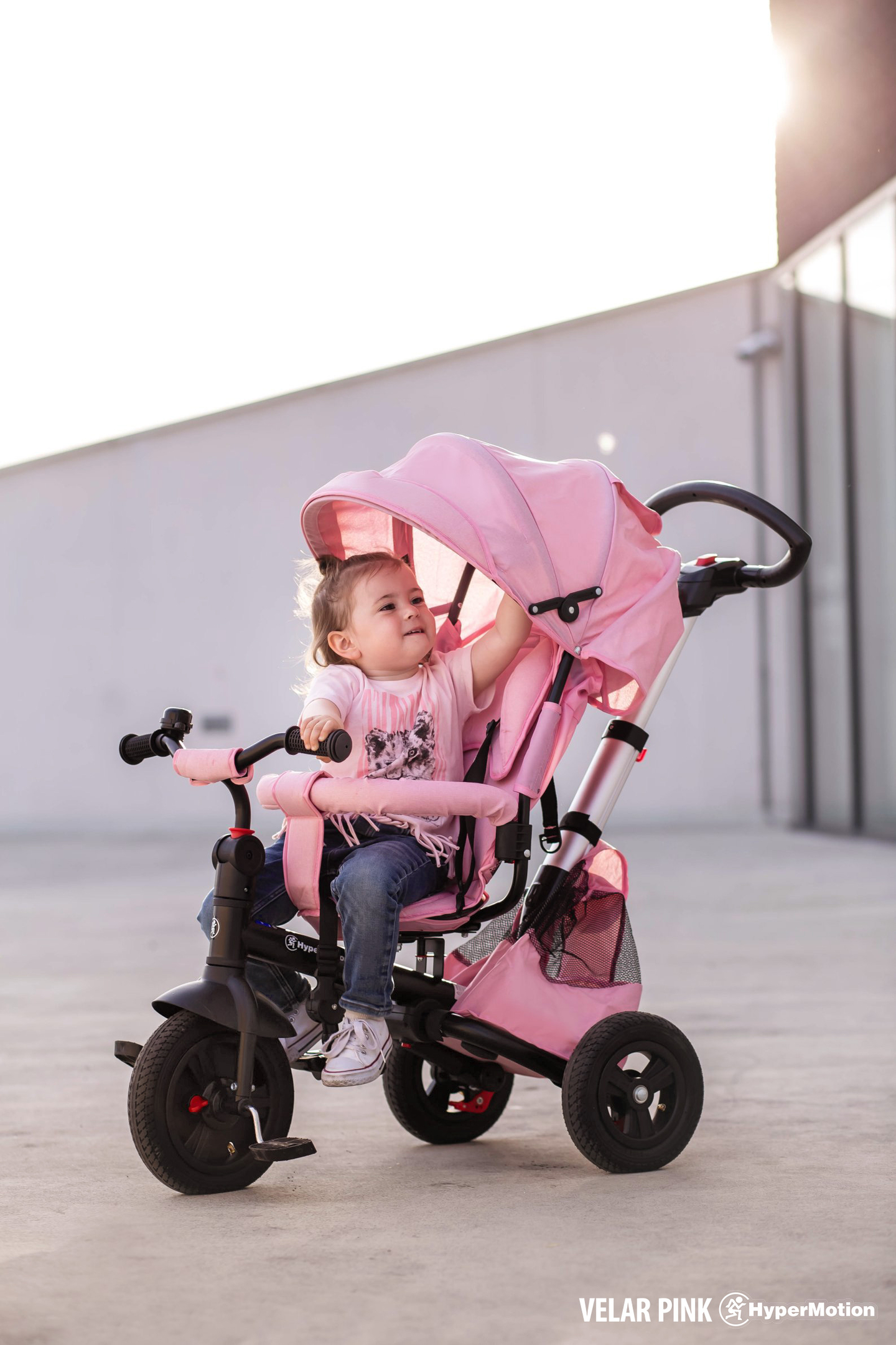 Tricycle Tobi Velar + film de pluie - rose