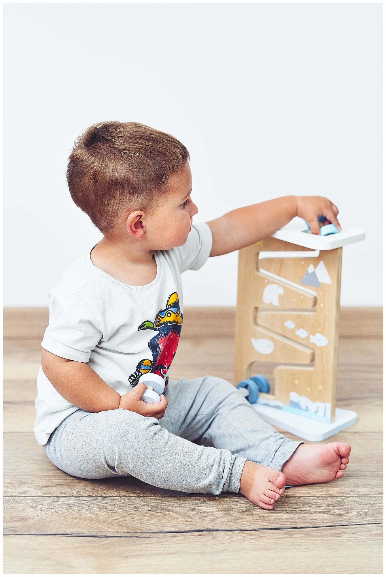 Planche de manipulation sensorielle en bois à deux faces