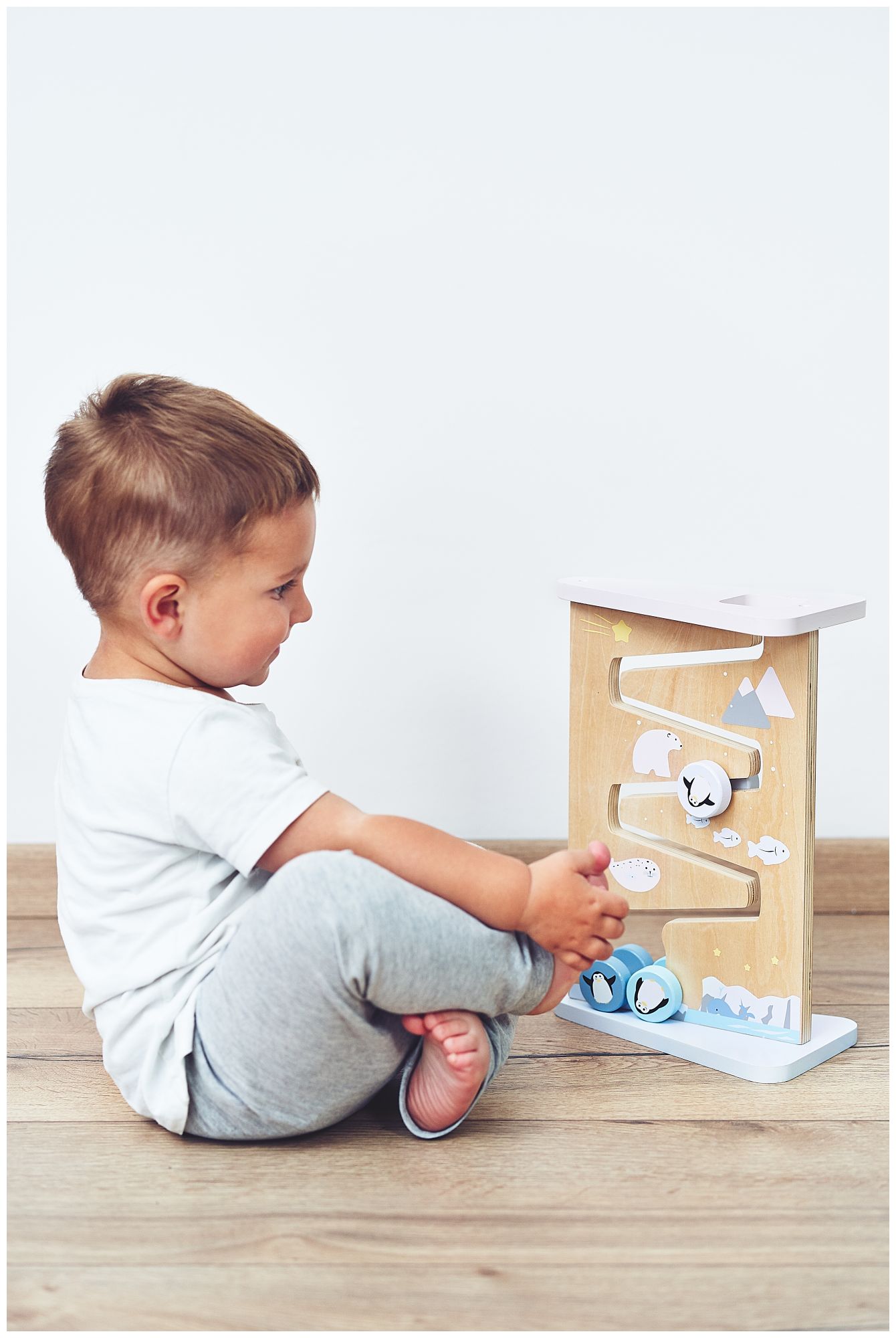 Planche de manipulation sensorielle en bois à deux faces