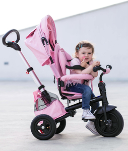 Tricycle Tobi Velar + film de pluie - rose